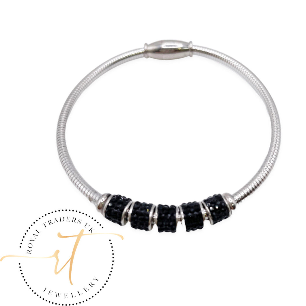 Bella silver plated bracelet with black gems and magnetic lock.